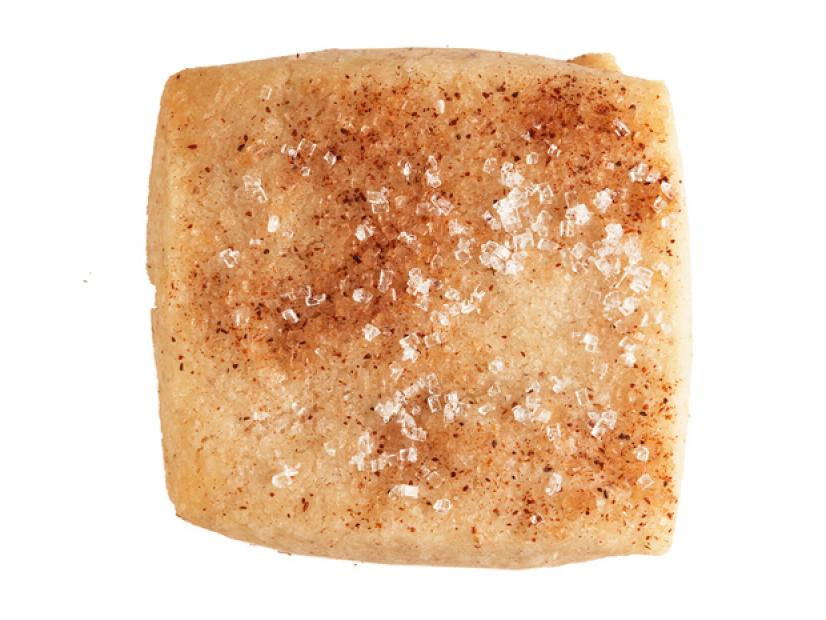A Cinnamon Cardamon Sprinkled with spices and sugar