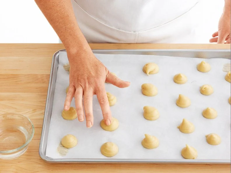 Pressing Down the Tops of Pastry Dough