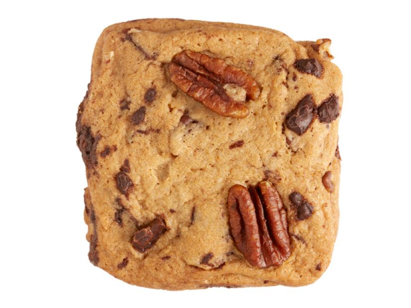 A Chocolate Pecan Chip Cookie Square against a white background