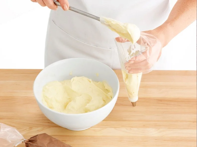 Pastry Creme Being Put Into a Pastry Bag