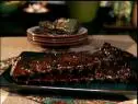 Two slabs of Honey Mustard Glazed Ribs stacked on a plate