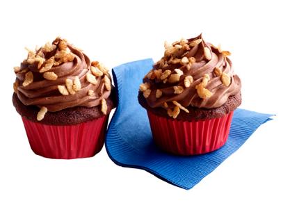 Mini chocolate cupcakes in red cupcake wrappers with chocolate toppings and Rice Krispies