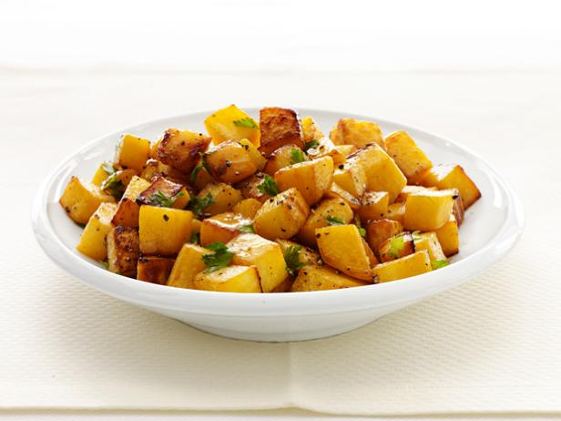 Diced roasted Rutabaga in a white bowl
