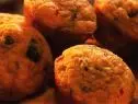 Several Spicy Cornbread Muffins in a basket
