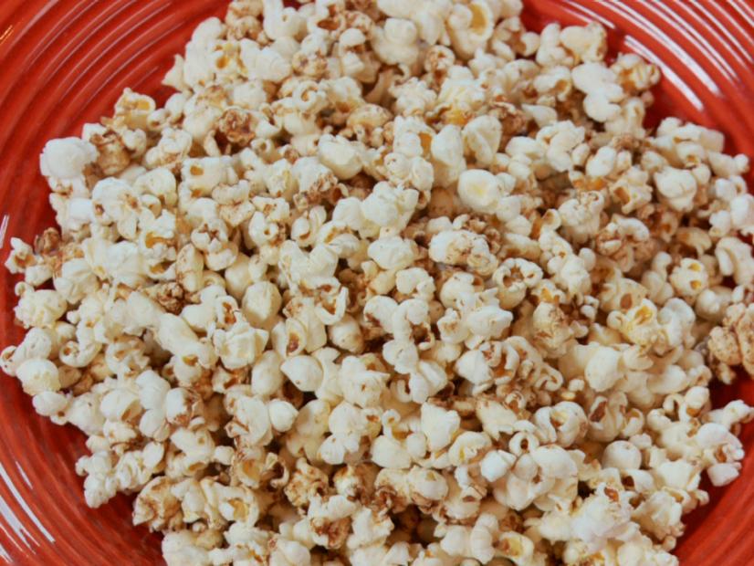 Popcorn in a red bowl with ridges