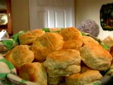 For a taste of homemade comfort, bake Alton Brown's buttery, flaky Southern Biscuits recipe from Good Eats on Food Network.