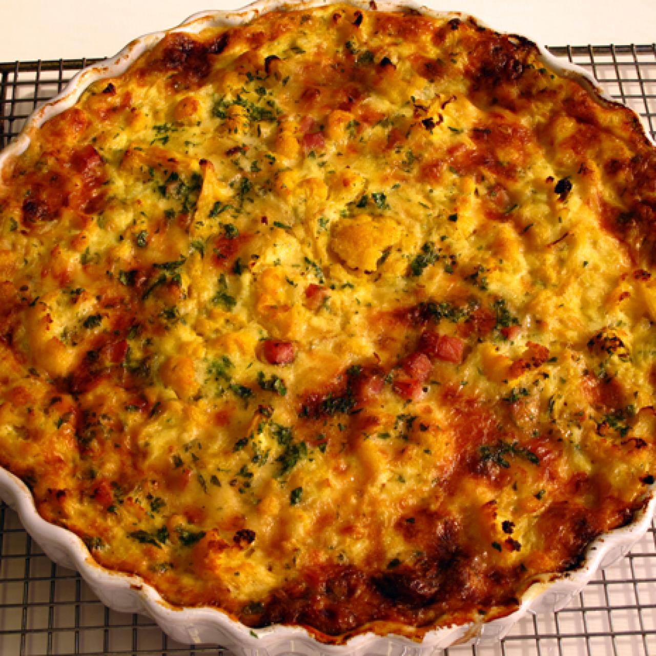 https://food.fnr.sndimg.com/content/dam/images/food/fullset/2009/3/13/0/CauliflowerQuiche_s4x3.jpg.rend.hgtvcom.1280.1280.suffix/1371589431599.jpeg