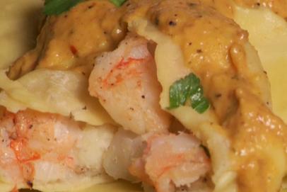 Shrimp and Salt Cod Ravioli with Yellow Pepper Romesco Sauce