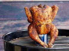 Don't just drink your beer; use it to grill a Beer Can Chicken recipe from Food Network. The indirect heat helps create a moist, dry-rubbed whole chicken meal.