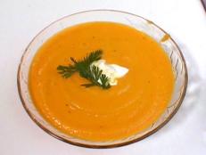 Puree this creamy recipe for Ginger Carrot Soup from Food Network with cream and freshly grated ginger.