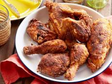 For foolproof fried chicken, try Alton Brown's recipe from Good Eats on Food Network; instead of seasoning the flour, season the meat so the spices don't burn.