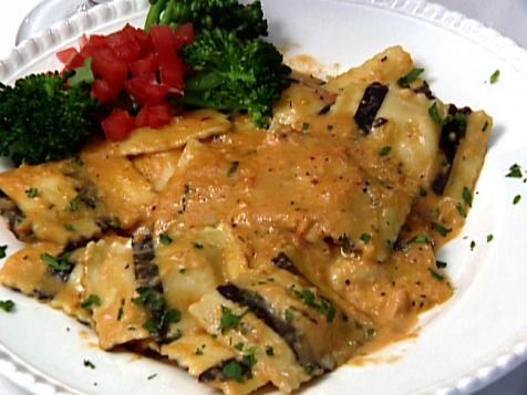 Black and White Lobster Ravioli in a Seafood Cream Sauce