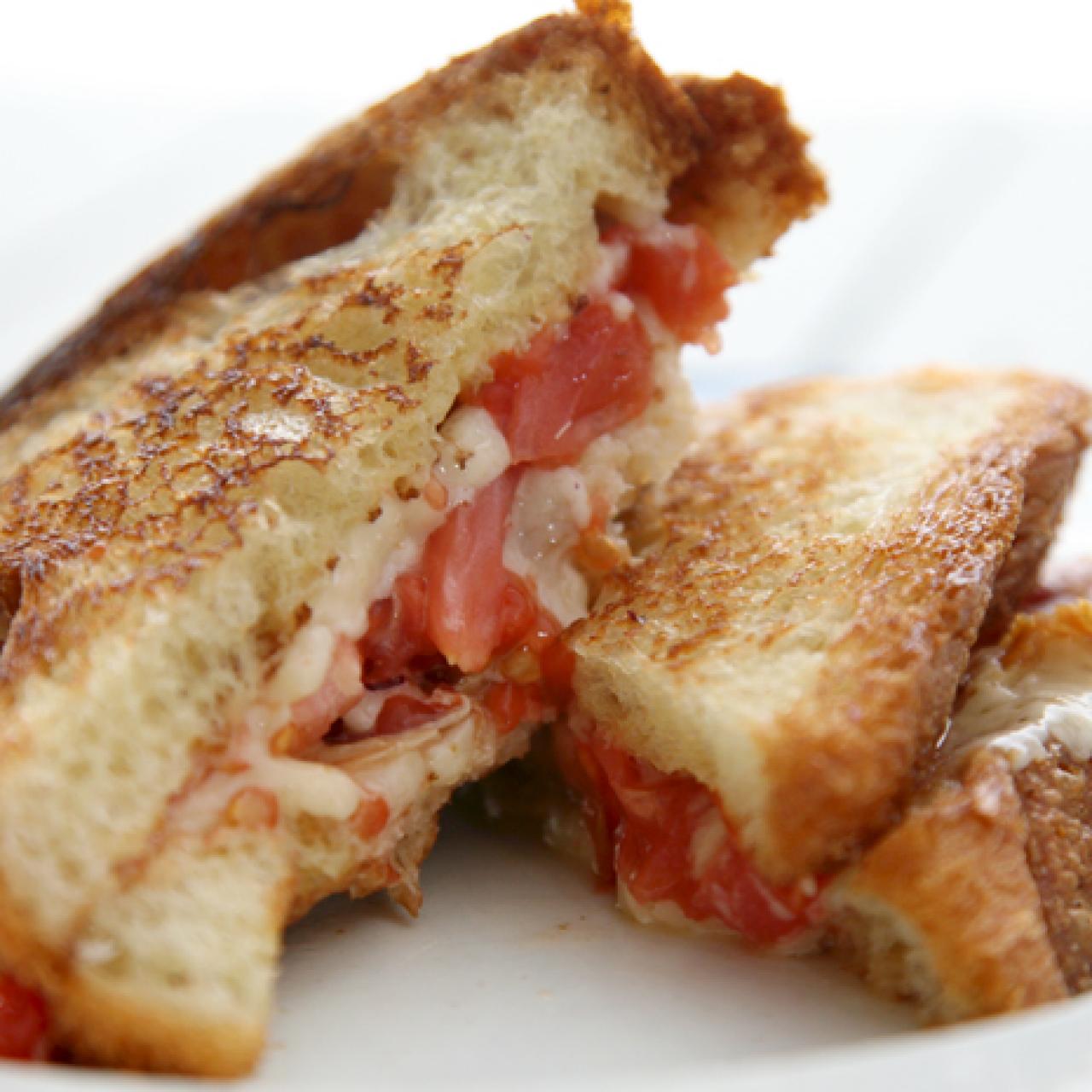 https://food.fnr.sndimg.com/content/dam/images/food/fullset/2009/7/15/0/GrownUpFarmhouseGrilledCheese_s4x3.jpg.rend.hgtvcom.1280.1280.suffix/1371591330822.jpeg