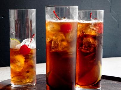 Three Glasses of Cherry Cuba Libre on a Serving Tray