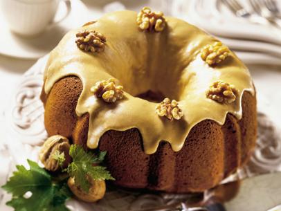Pumpkin Cake with Nuts on an Elaborate White Plate