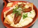 Hot Brown with Tomatoes and Bacon in a Brown Dish