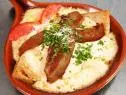 Hot Brown with Tomatoes and Bacon in a Brown Dish