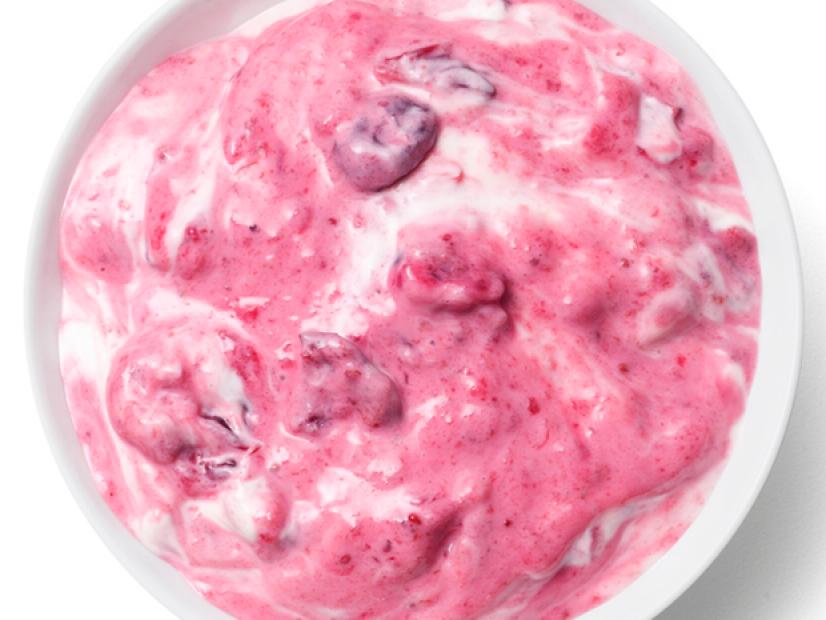 Sour Cream and Cranberry Mixture in a White Dish against a White Background