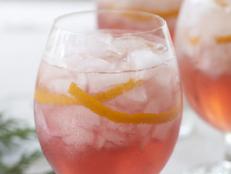 Holiday Cocktail with Ice and Citrus Peels