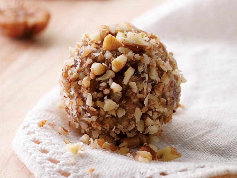 Ball Shaped Dessert with Nuts on a White Cloth