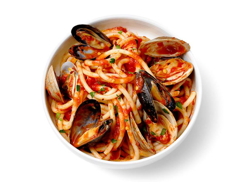 Close up of Pasta with Shell Fish  in a white bowl