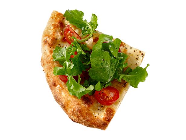 A slice of pizza topped with salad