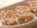 Oatmeal Peanut Butter Bars in a cream colored dish