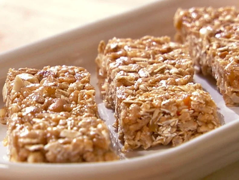 Oatmeal Peanut Butter Bars in a cream colored dish