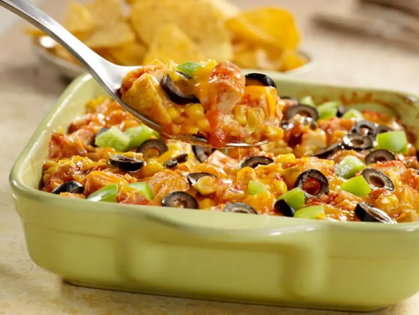Chicken Tortilla Casserole in a lime green baking dish