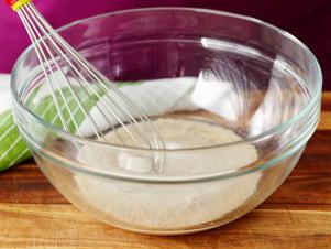 Whisk In Sugar With Yeast And Warm Water For Rolls
