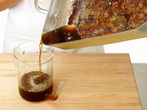 Pour Turkey Pan Drippings In Degreasing Cup