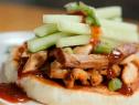 Scallion pancakes with crispy turkey and cranberry hoisin sauce topped with julienned cucumber.