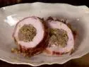 Sausage and mushroom stuffing rolled in a boneless turkey breast.