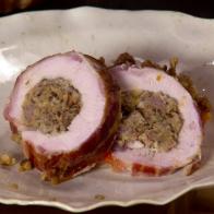 Sausage and mushroom stuffing rolled in a boneless turkey breast.
