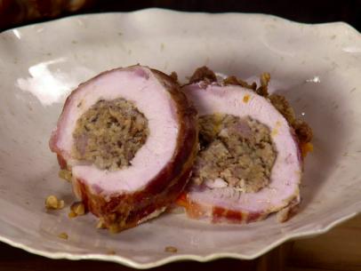 Sausage and mushroom stuffing rolled in a boneless turkey breast.