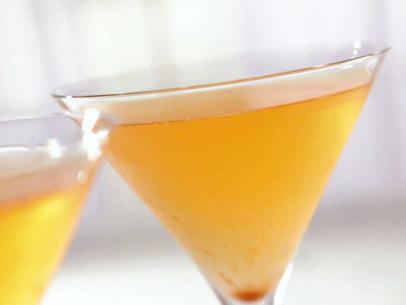 Pumpkin pie spice martini served in a martini glass.
