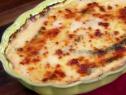Potato and poblano gratin is topped with grated Monterey Jack cheese.