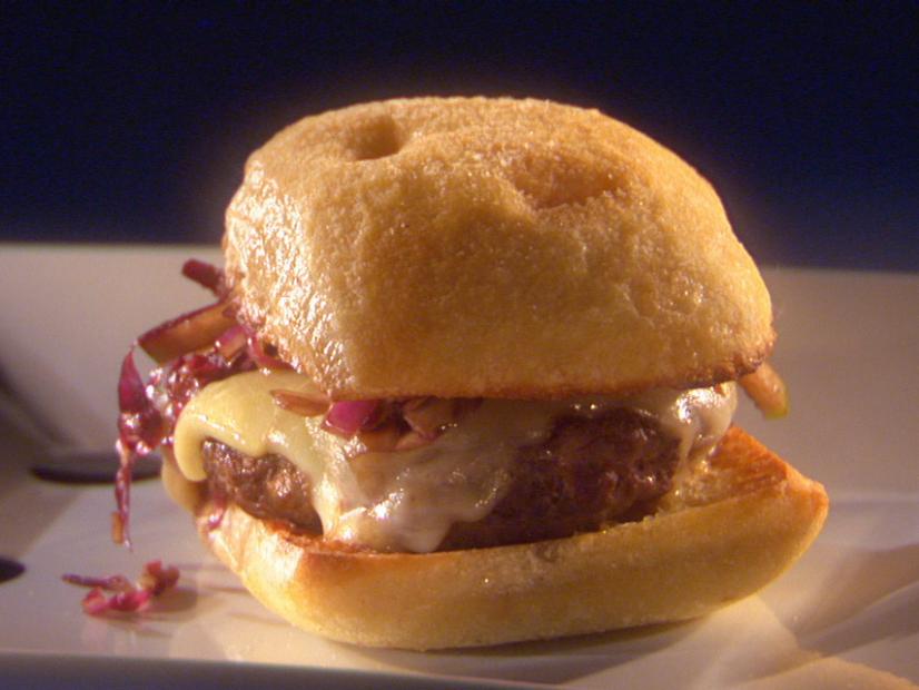 Tuscan Burger on a gray square plate against a purple background