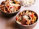 SAUSAGE AND ROASTED VEGETABLE PENNE Melissa d’Arabian Ten Dollar Dinners/Penne for Pennies Food Network Sweet Onion, Zucchini, Red Bell Pepper, Button Mushrooms, Olive Oil, Grape Tomatoes, Sweet or Hot Italian Sausage, White Wine, Whole Grain Penne Pasta, Parmesan