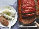 NEW CLASSIC MEATLOAF, Ellie Krieger, Food Network, Olive Oil, Onion, White ButtonMushrooms, Carrot, Tomato Paste, Dried Thyme, Garlic, Quick-Â­Cooking Oats, Eggs,Worcestershire Sauce, Tomato Sauce, Mustard, Unsulphered Molasses