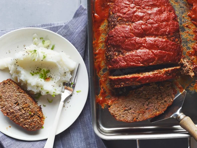 NEW CLASSIC MEATLOAF, Ellie Krieger, Food Network, Olive Oil, Onion, White ButtonMushrooms, Carrot, Tomato Paste, Dried Thyme, Garlic, Quick-Â­Cooking Oats, Eggs,Worcestershire Sauce, Tomato Sauce, Mustard, Unsulphered Molasses