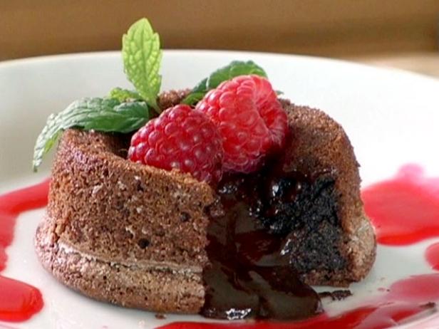 Molten Chocolate Cakes with Raspberry Sauce image