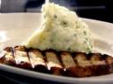 Horseradish potato puree is served wtih a slice of toasted sourdough bread.