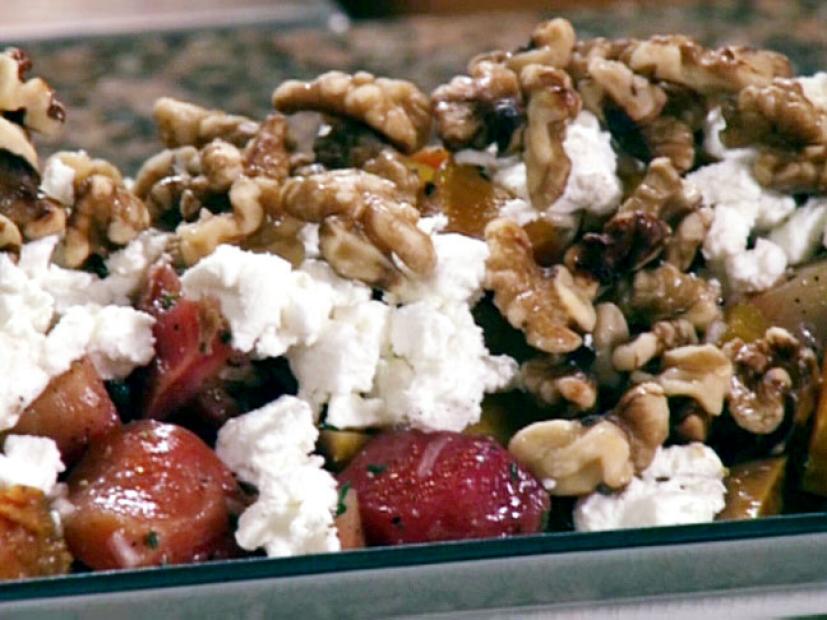 Roasted beet salad with crumbled goat cheese and candied walnuts.