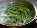 Sauteed green beans with soy, shallots, ginger, garlic, and chile.