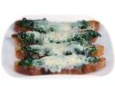Four pieces of Ciabatta Bread covered in baby spinach and Fontina Cheese on a plain square white dish