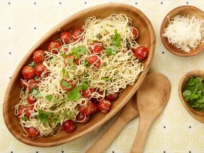 Chef Name: Ina GartenFull Recipe Name: Capellini with Tomatoes and BasilTalent Recipe: Ina Gartenâ  s Capellini with Tomatoes and Basil, as seen on Food Networkâ  s Barefoot ContessaFNK Recipe: Project: Foodnetwork.com, CINCO/SUMMER/FATHERSDAYShow Name: Barefoot Contessa