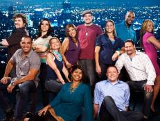 Group Photo of Next Food Network Star 6 Rivals against a cityscape backdrop