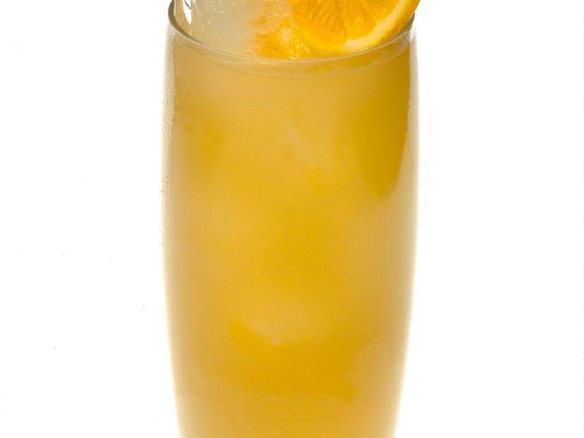 A Beachcomber garnished with orange slices in a highball glass 