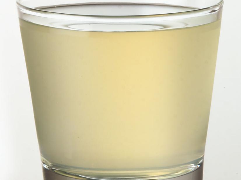 A Kamikaze cocktail in a lowball glass against a white background